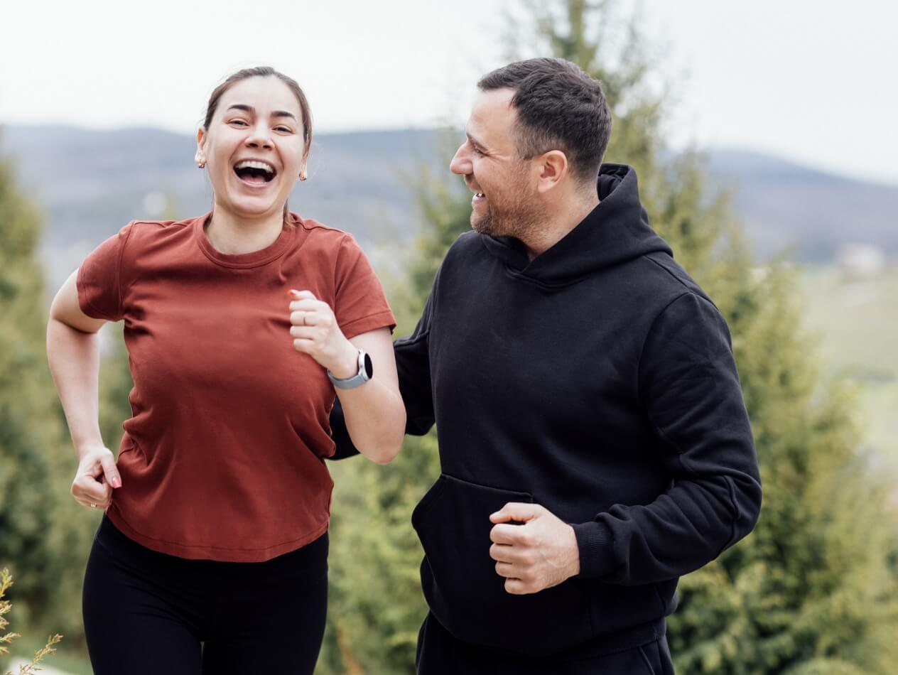 smiling-attractive-woman-and-handsome-man-jogging-2024-08-05-23-34-44-utc (1)