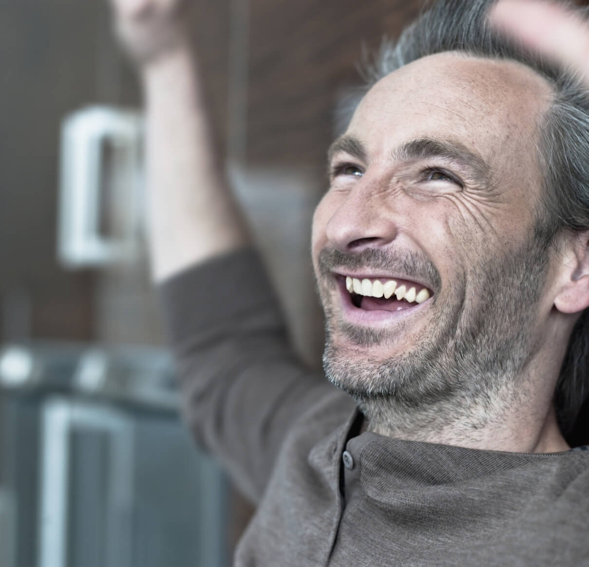 germany-hamburg-man-cheering-and-laughing-portr-2024-09-18-15-14-27-utc (2)